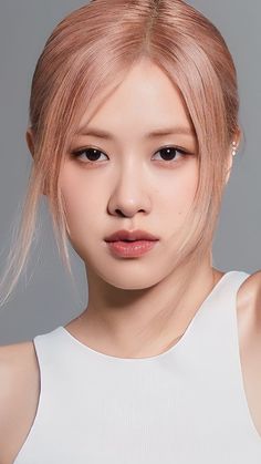 This contains an image of blackpink Rosé  on a white vest looking beautiful