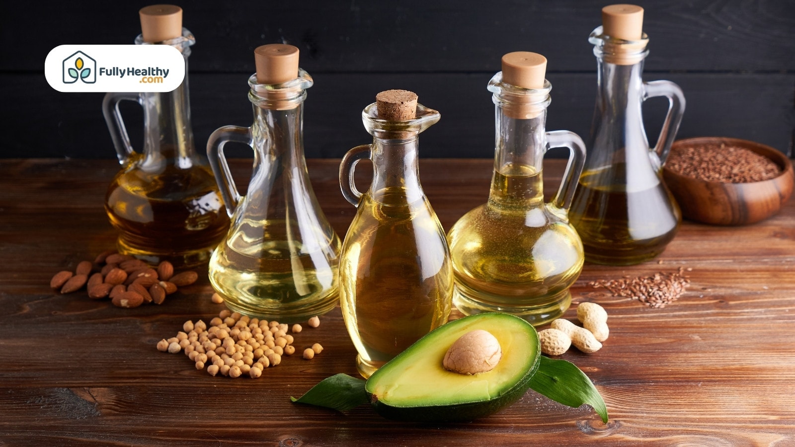 Assorted bottles of oils with avocado soybeans almonds and peanuts