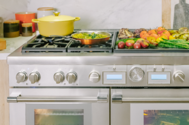 top high end appliances for your kitchen remodel thermador dual fuel range with cookware and vegetables custom built michigan