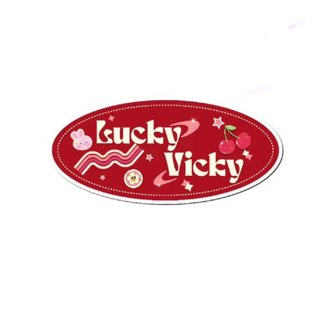 This may contain a sticker with the words lucky vicky on it and cherries in pink