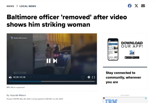 a woman struck by a Baltimore police officer