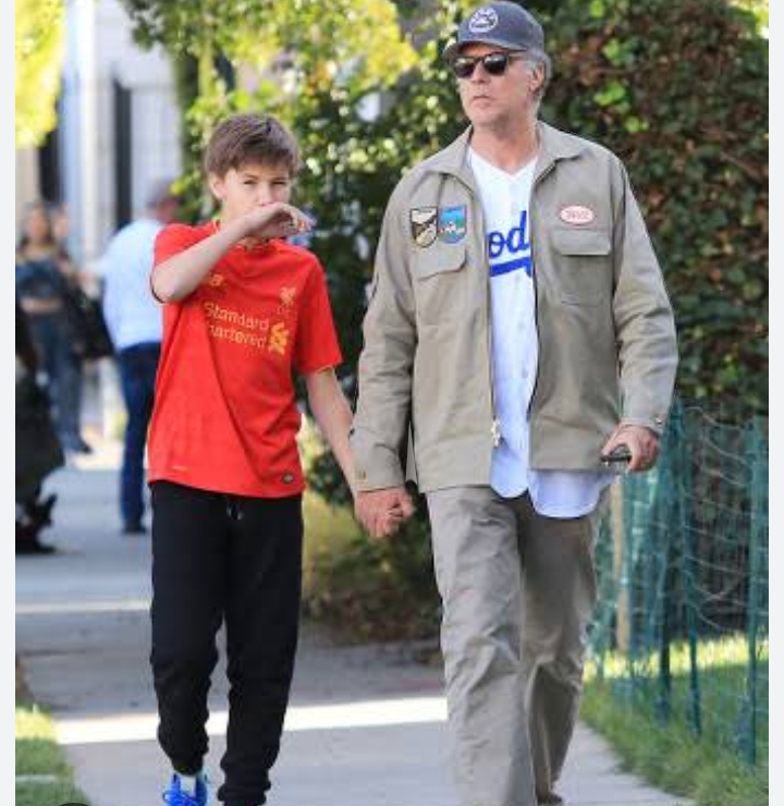 a younger Mattias Paulin Ferrell walking with his dad