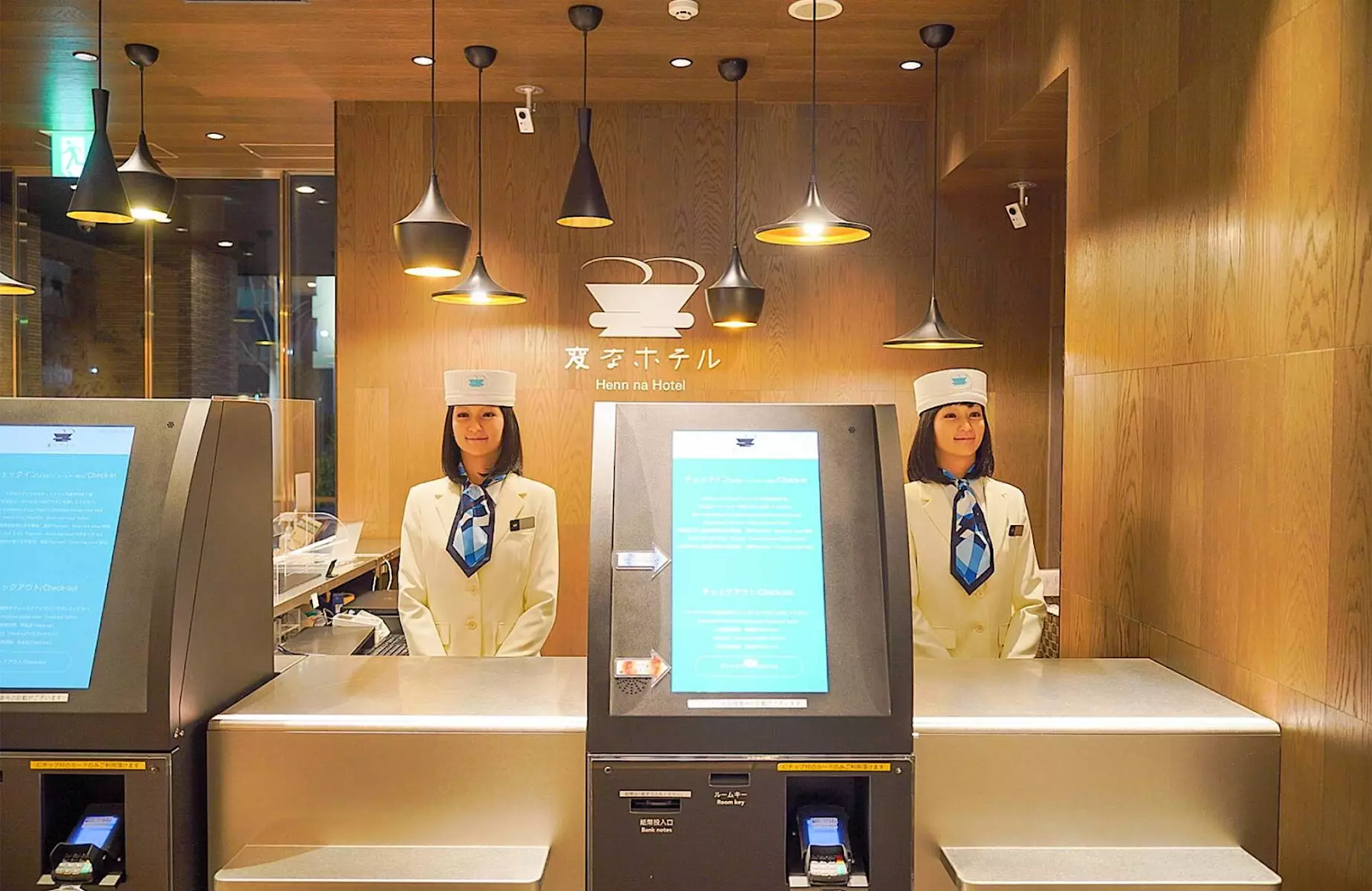 Henn na Hotel robotic check-in staff at the front desk