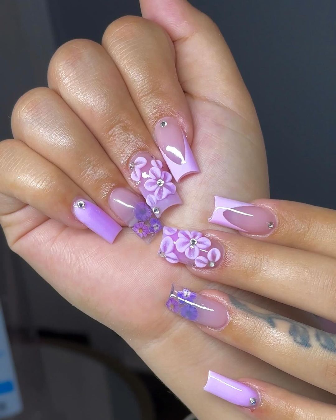 Close-up of hands having lavender nails with Soft Contrast