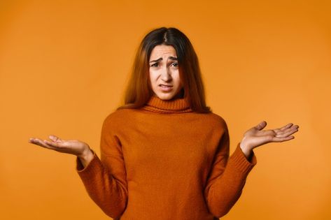 A picture of a girl wearing a brown dress