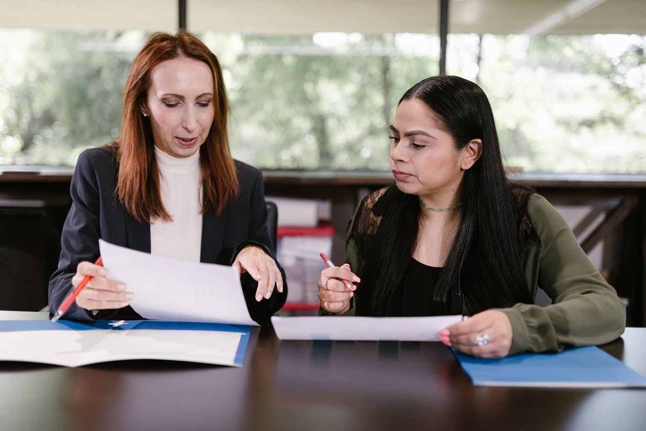 Two women looking over skill test
