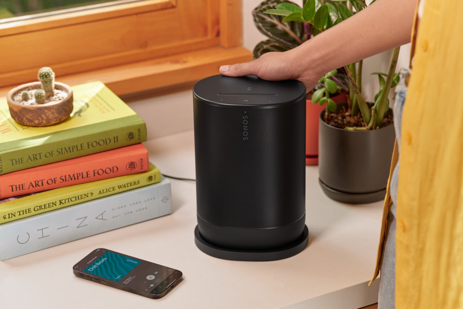 Sonos Move 2 in black color on desk.