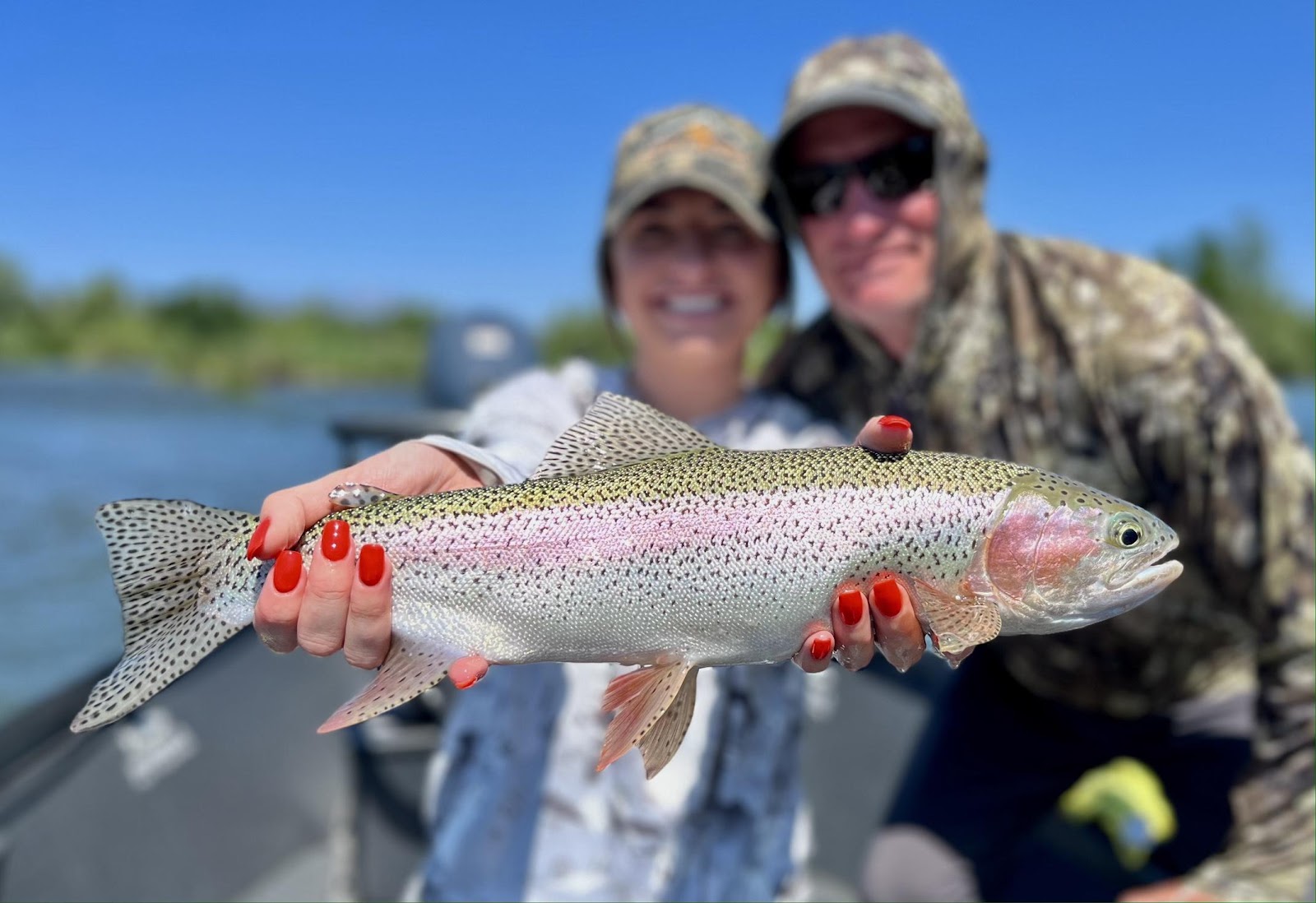 A person and person holding a fish

AI-generated content may be incorrect.