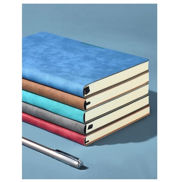 A stack of books and a pen

AI-generated content may be incorrect.