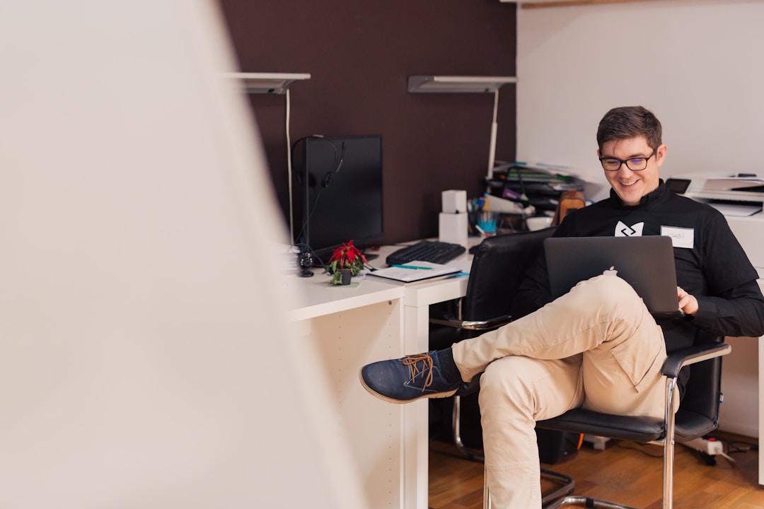 A male professional streamlining customer feedback management with customer reference software CRM