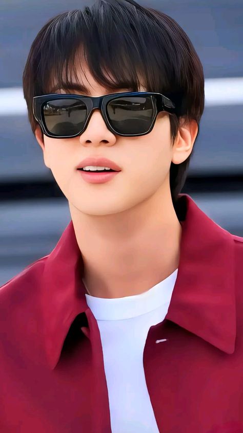 This contains an image of BTS Jin