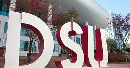 A large red and white letters

AI-generated content may be incorrect.