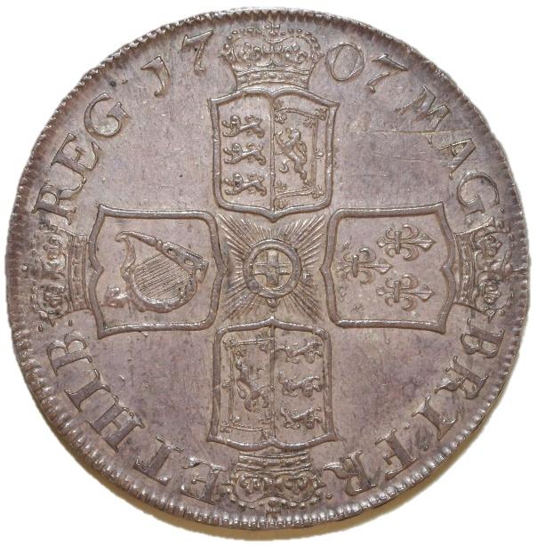 A close-up of a coin

Description automatically generated