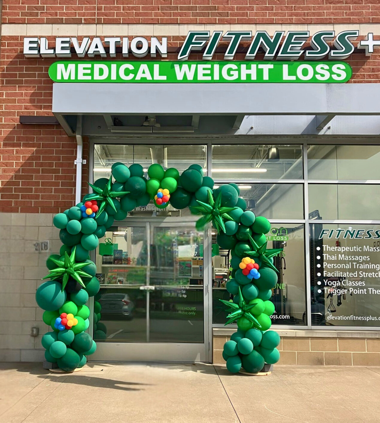 Green Balloon Arch with Starburst in Pittsburgh by Party on Butler for Corporate Event