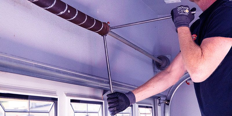 how to replace garage door spring