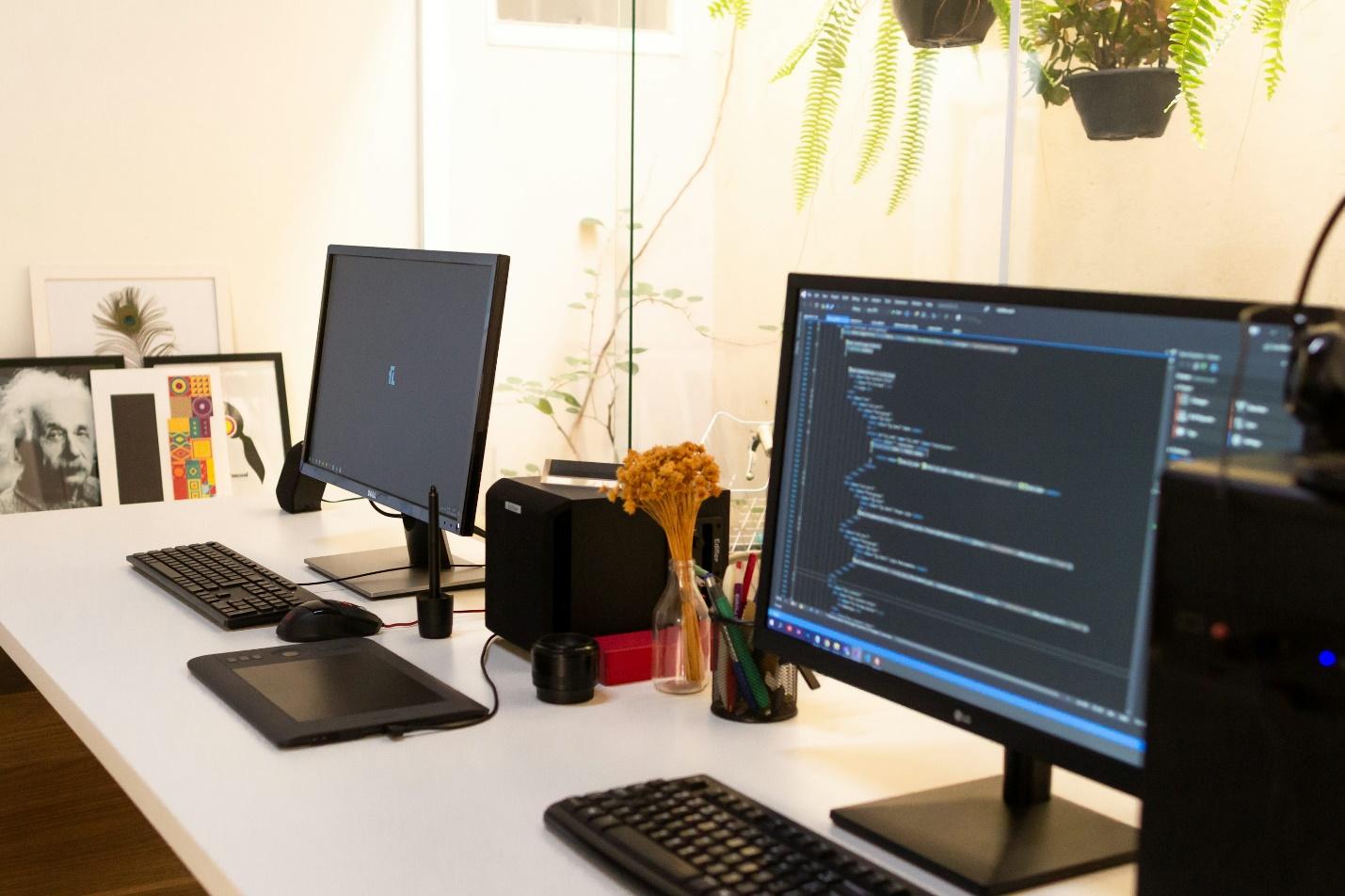 Two desktop computers side by side