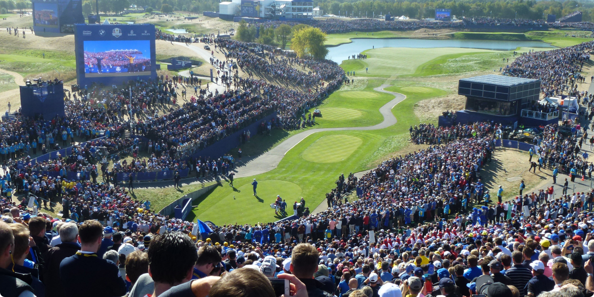 "Ryder Cup 2018 - Grand Stand" by Cutkiller2018 is licensed under CC BY-SA 4.0. To view a copy of this license, visit https://creativecommons.org/licenses/by-sa/4.0/?ref=openverse.