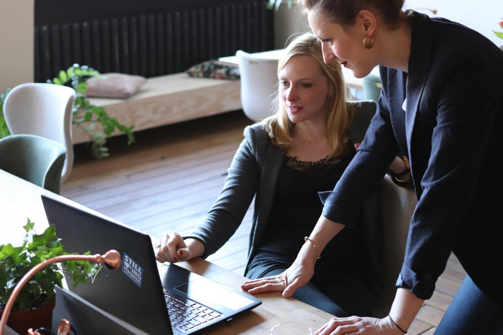 https://www.pexels.com/photo/two-women-using-on-black-laptop-computer-2041393/