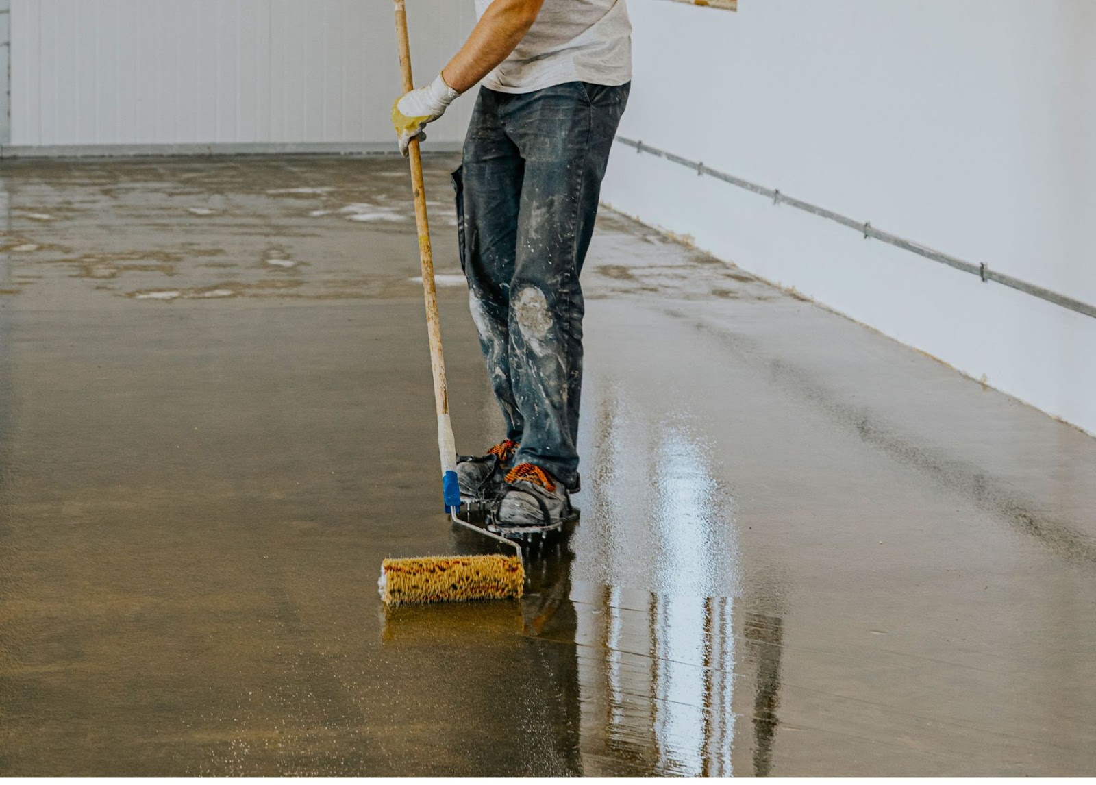 garage concrete coating installation of the polyaspartic base coat