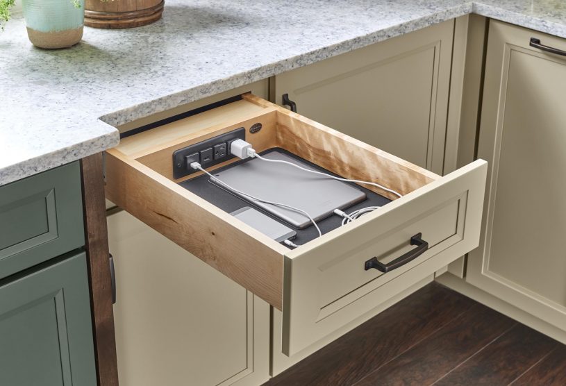 Kitchen drawer with built-in device charging ports.