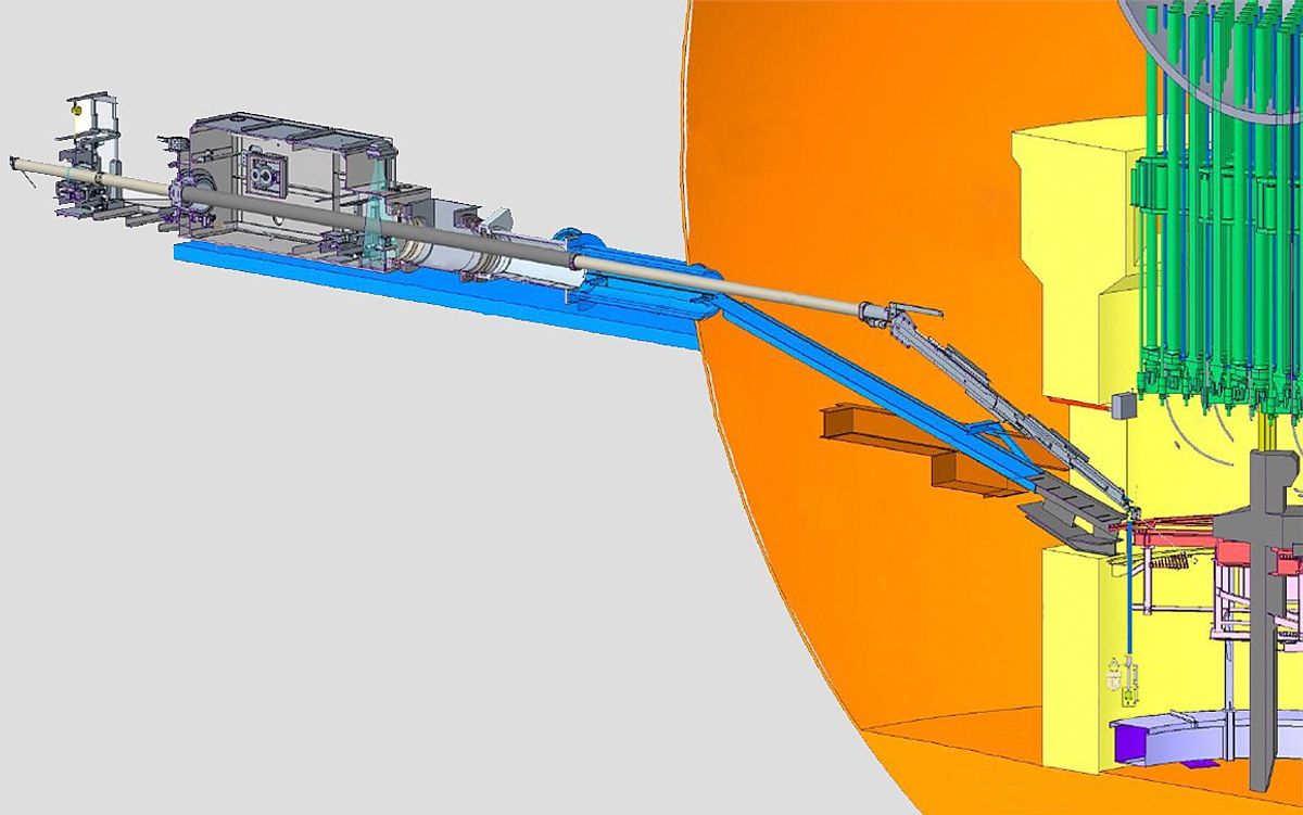 A line drawing shows the telescopic robotic device retrieving fuel from a reactor.