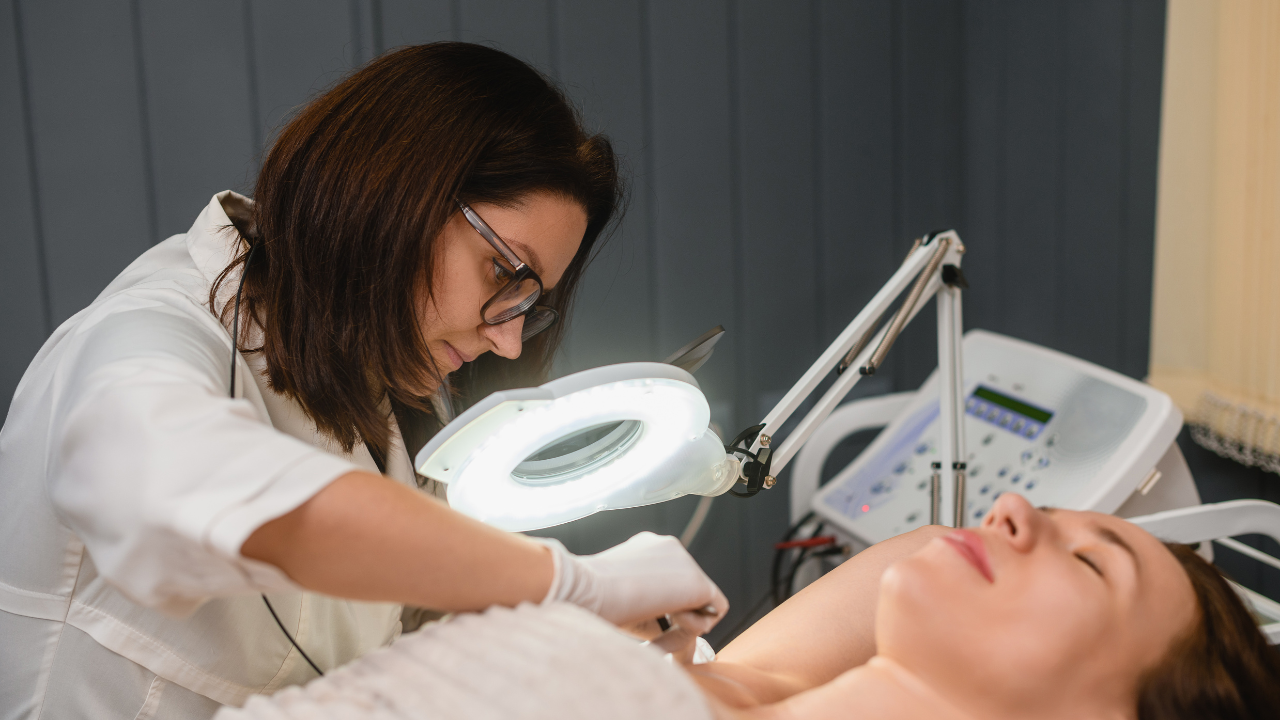 A picture of an Electrologists doing a electrolysis service on a client