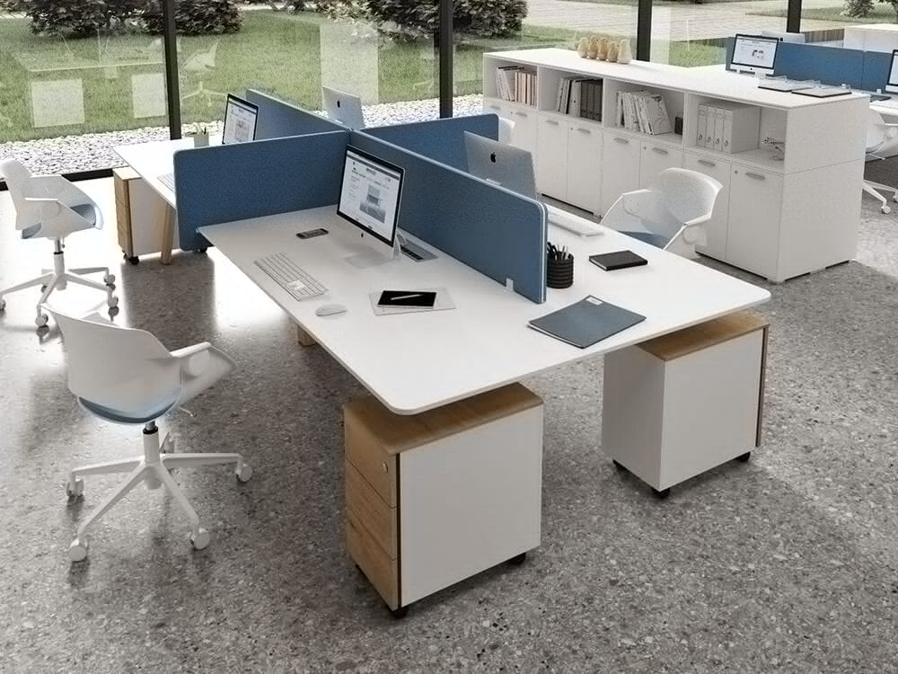 Proper office layout with dividing screens can help minimise noise and maximise productivity.