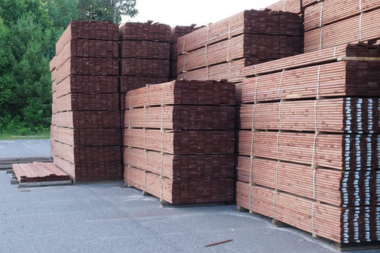 what is kdat lumber stacked decking boards in yard custom built michigan