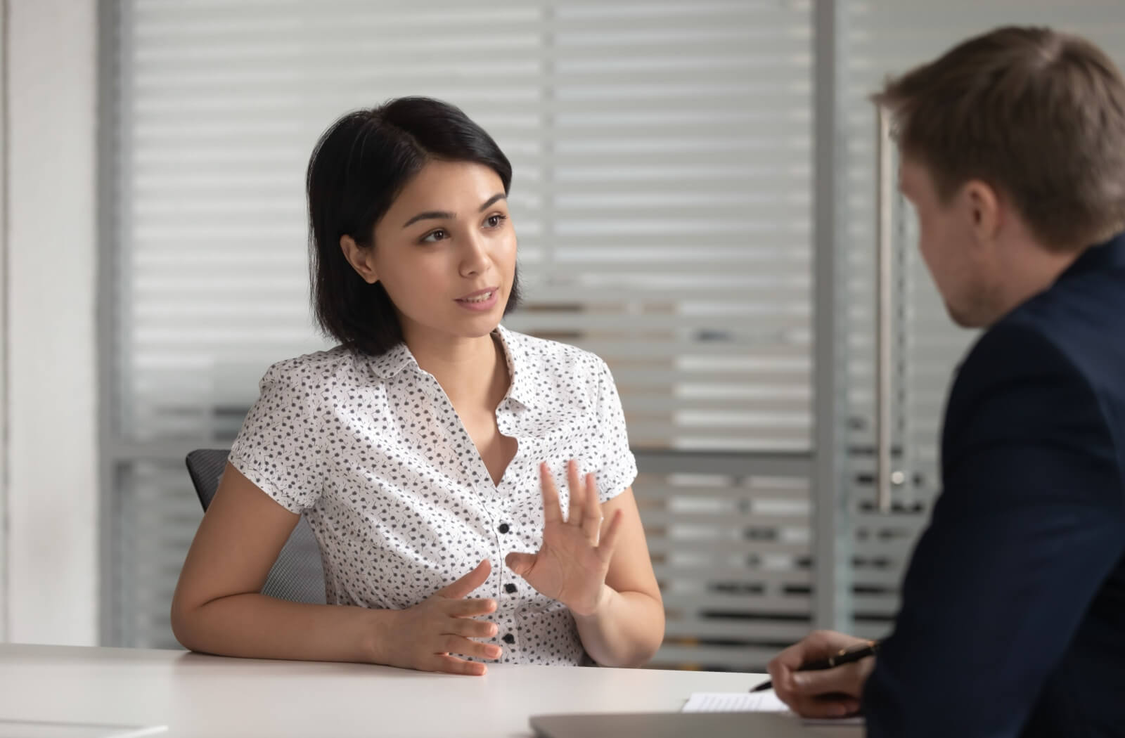 A potential borrower asking a loan officer about her rights.