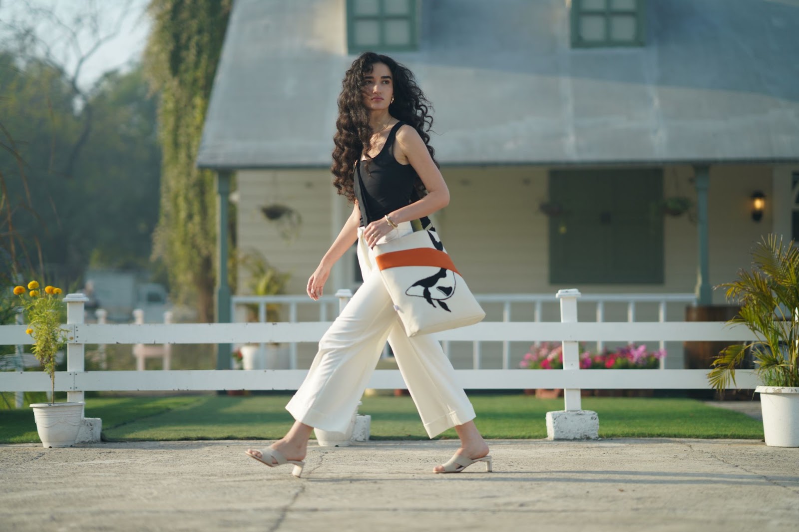 Eco-friendly Kaahu bag on a nature trail, reflecting slow fashion values.