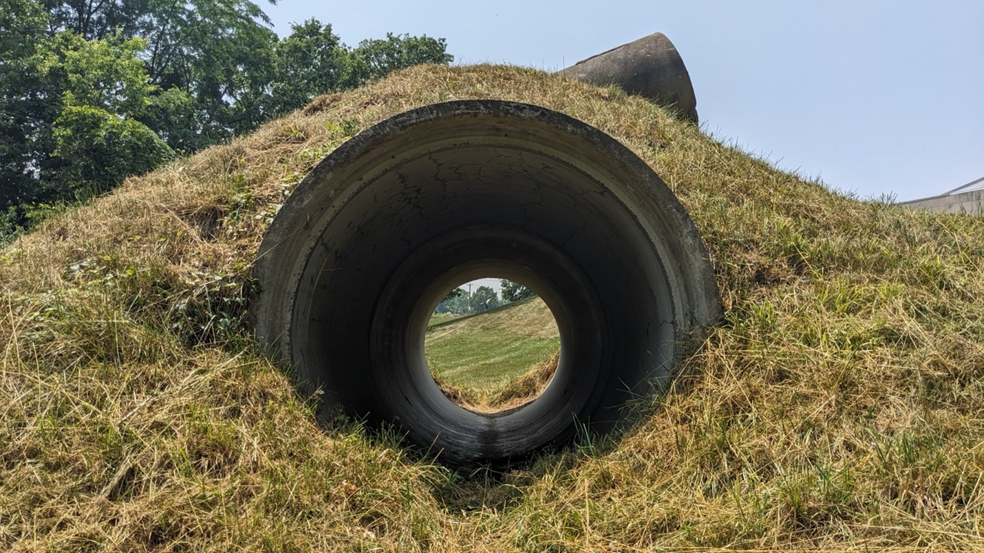 Image of the inside of one of the pipes in the sculpture - east to west concrete tunnel