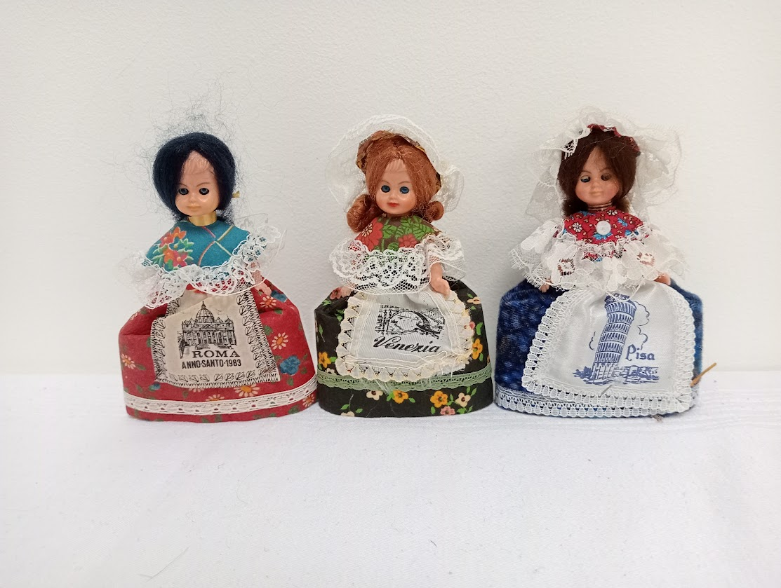 Various Italian dolls with detailed dresses