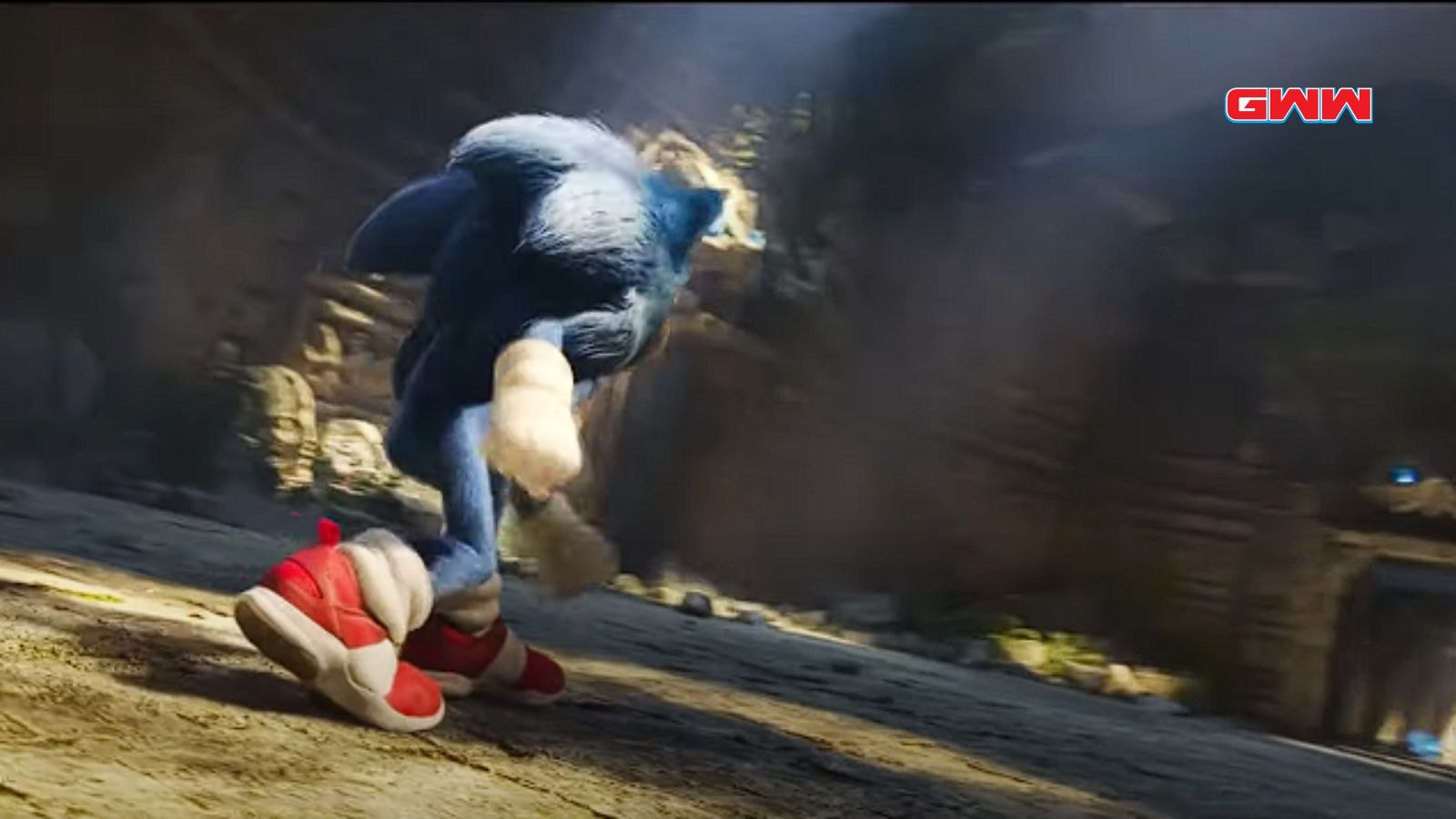 Sonic the Hedgehog charged with blue electricity, ready to fight.