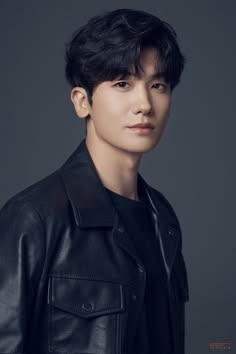 This contains an image of Park Hyung Sik, on a black cloth 