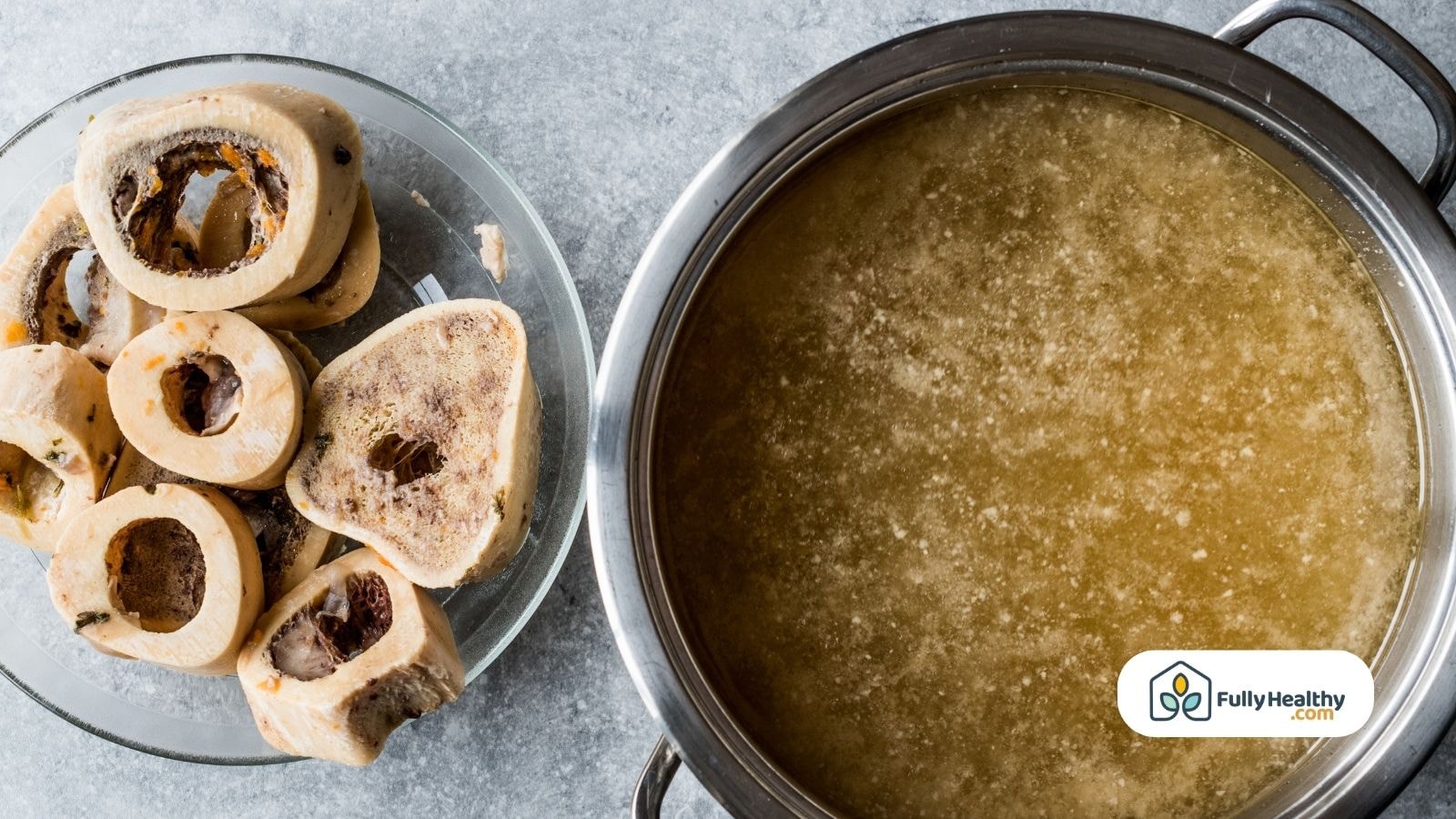 Boiled beef bones next to a pot of homemade bone broth