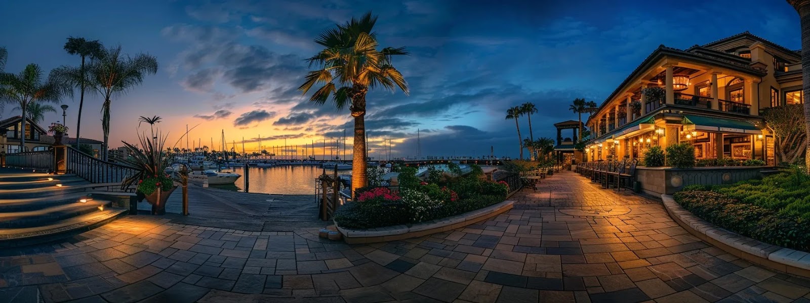 a scenic fine dining waterfront restaurant with a picturesque dockside entrance perfect for a special night out accessible by boat in newport beach harbor.