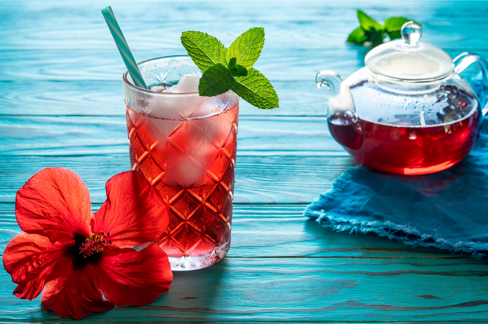 An illustration depicting the vibrant hibiscus flowers used to make hibiscus iced tea.