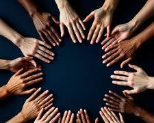 Image of Diverse hands coming together in a circle