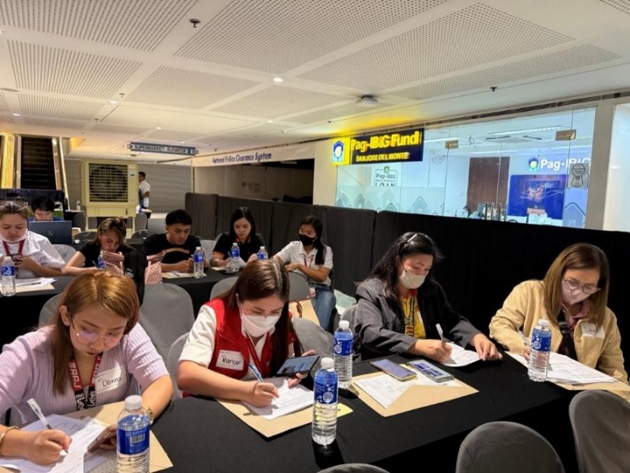 A group of people sitting at tables in a room with a few tables and a few tables with a few tables and a few tables with a few tables and a few tables with a few tables and

AI-generated content may be incorrect.