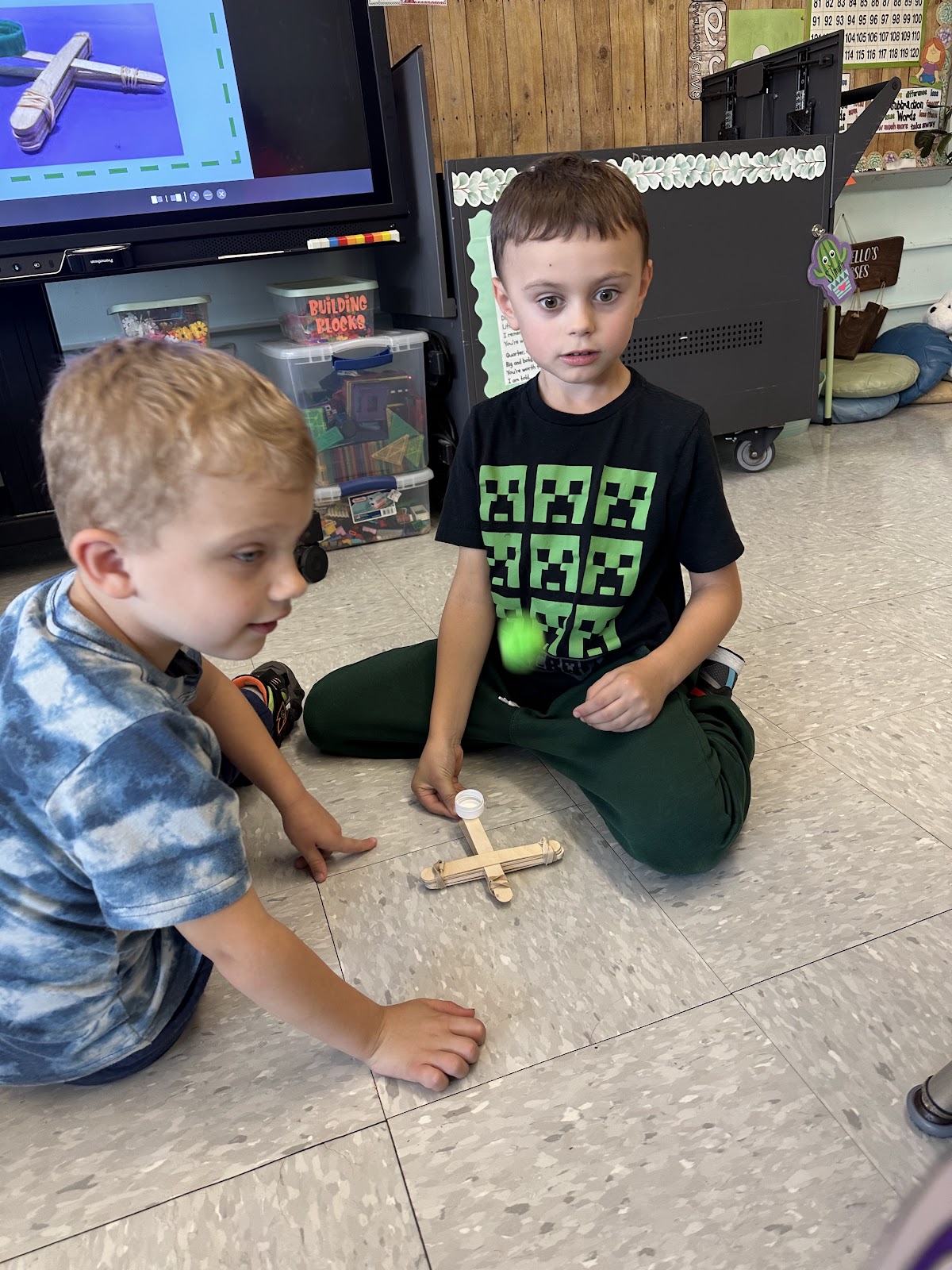 Image of student launching a homemade catapult