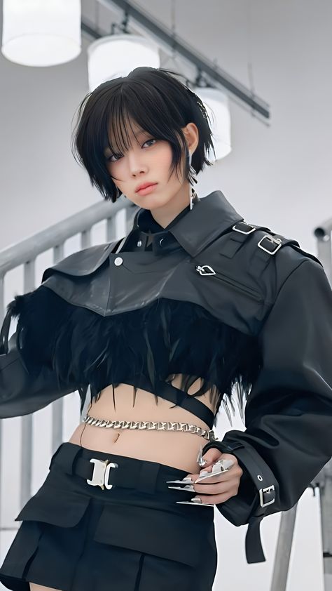 This contain an image of aespa's Winter  short black hair wearing a leather jacket and high waisted skirt is posing for the camera