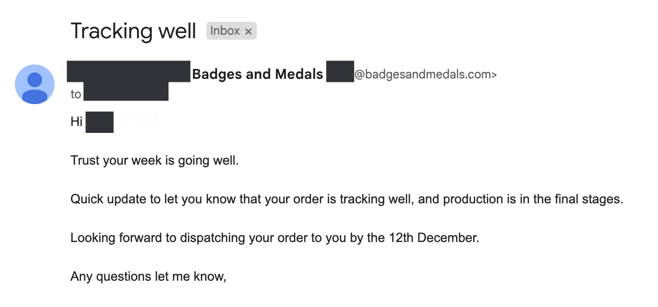 Email showing Badges And Medal's customer service update about tracking.