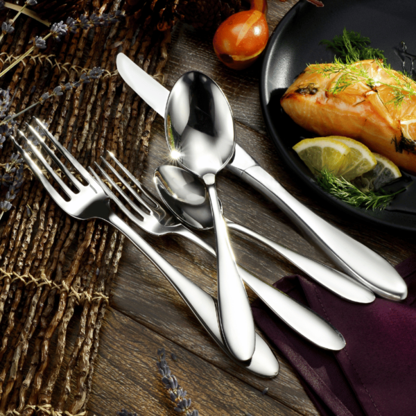 Liberty Tabletop stainless steel flatware with a salmon dinner.