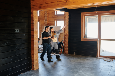 common contractor and remodeling project misconceptions remodelers walking through jobsite custom built michigan