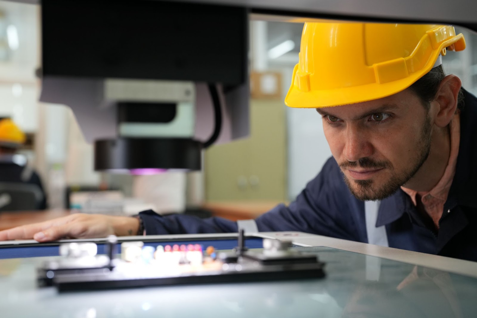 A man testing an electronics product before finalizing its design