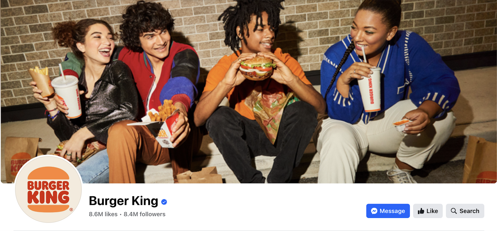 Burger King's Facebook cover photo featuring young adults eating together