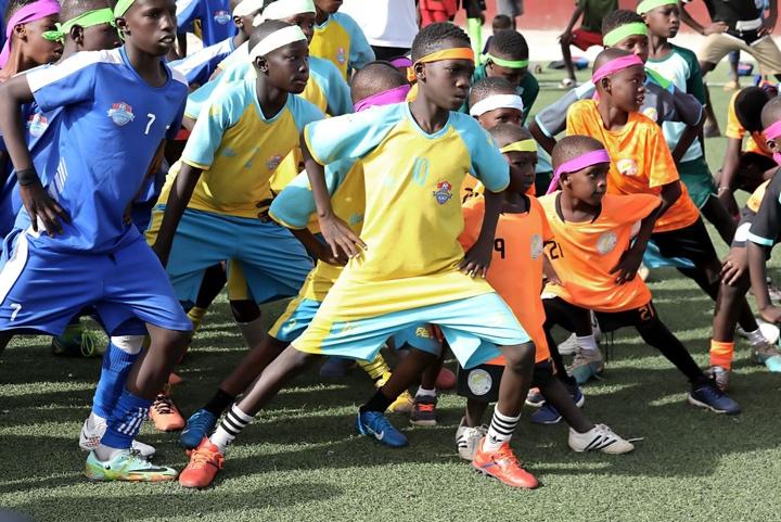 A group of kids in sports uniforms

AI-generated content may be incorrect.