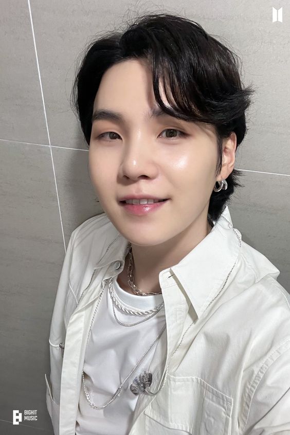 A picture of Suga on. white shirt 