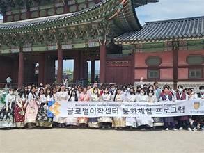 A group of people holding a banner

AI-generated content may be incorrect.