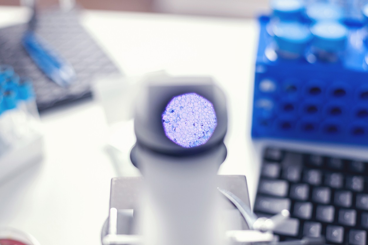 close-up-of-a-microscope-showing-purple-cells-on-slide-in-modern-laboratory-setting-the-livagen-biohacker-stack-thats-fueling-the-next-generation-of-superhumans-tony-huge